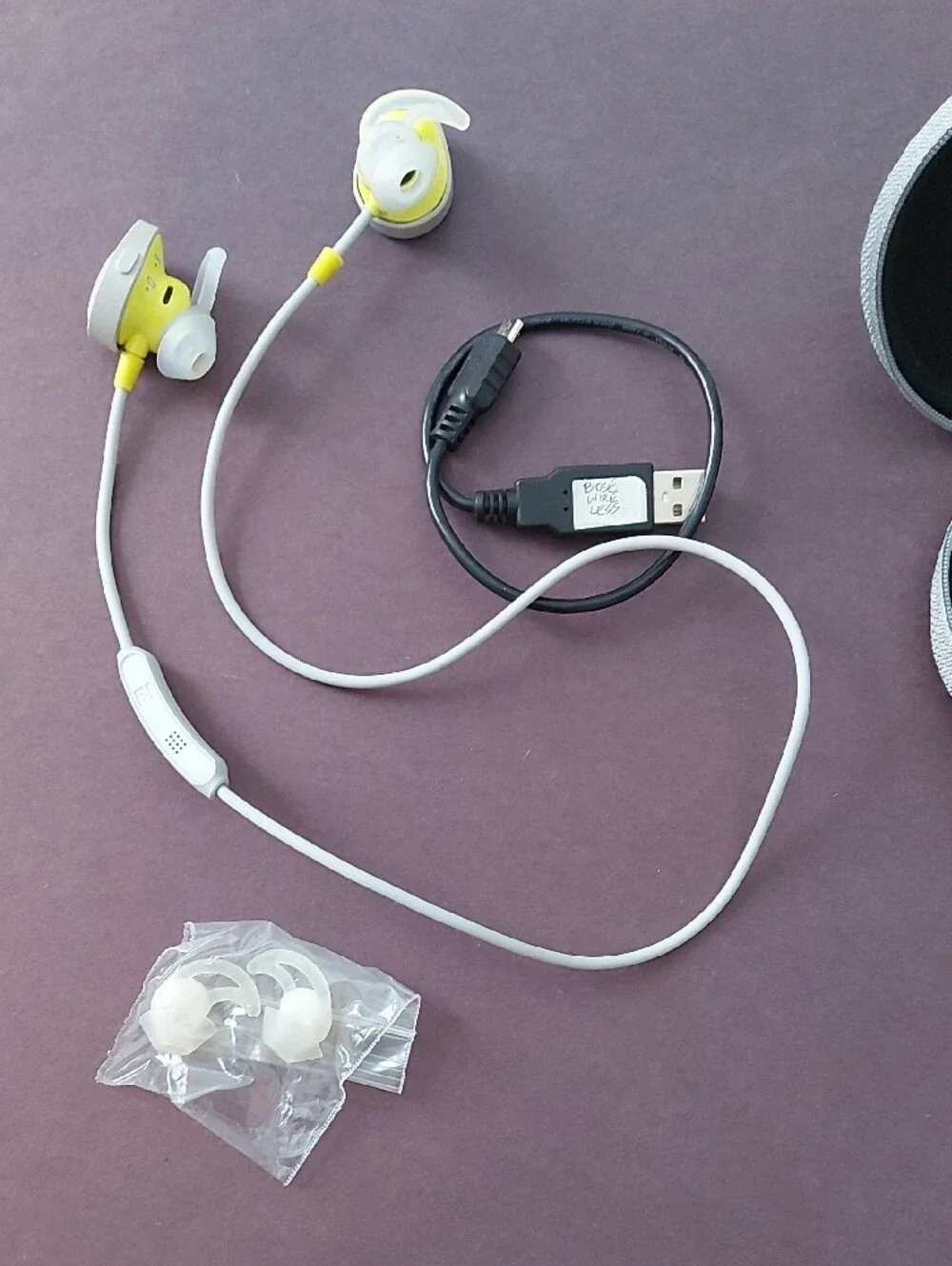 Bose Light Gray Round Earbud Case with Yellow Logo